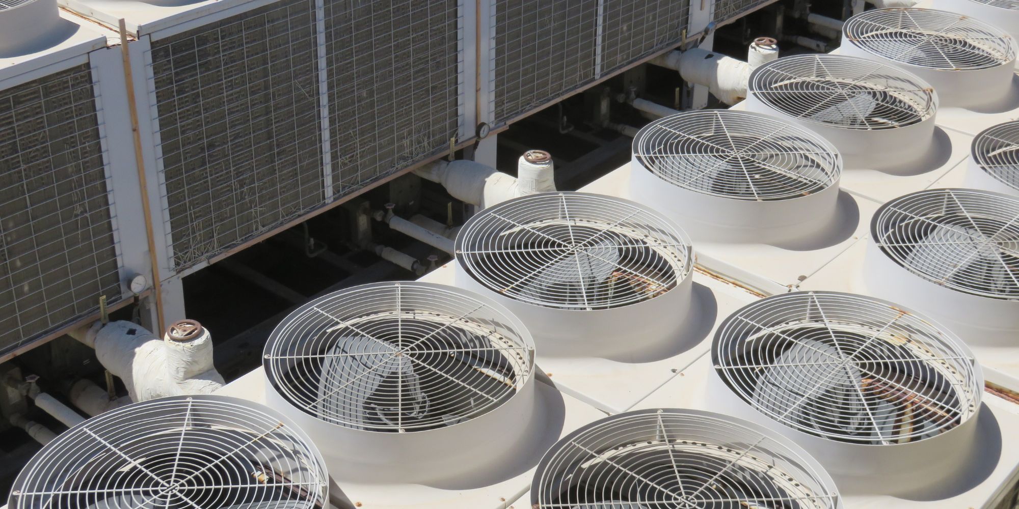 Cooling production from waste heat